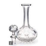 A mid 19th Century glass decanter, of globe and shaft form, the body decorated with printie cut