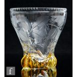 An early 20th Century Webb Corbett Rock crystal style vase of flared form, relief moulded with