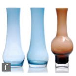 A pair of 20th Century Riihimaki glass vases, of low shouldered sleeve form decorated in pale blue