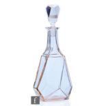 A Czechoslovakian Art Deco Alexandrite glass decanter of tall angular form in dichloric mauve to