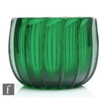 A late Georgian Bristol green finger bowl of swollen circular section with heavily fluted body