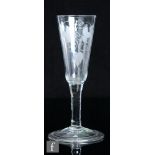An 18th Century ale glass, circa 1750, the drawn trumpet bowl engraved with hops and barley above