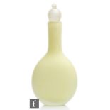 A Barovier & Toso Murano decanter, circa 1960, the frosted yellow ovoid flask-shaped decanter with