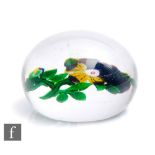 A 19th Century French paperweight by Baccarat circa 1850, decorated with a type 3 pansy with bud,