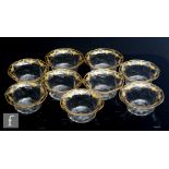 A set of nine late 19th Century Thomas Webb & Sons clear crystal finger bowls of wrythen fluted