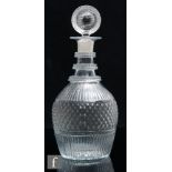 A 19th Century American glass decanter of Prussian form, the moulded body with a band of diamonds