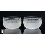 A set of eight 19th Century clear crystal finger bowls each with a Greek Key border above frosted