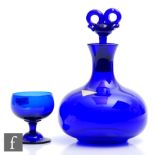 A Gullaskruf glass decanter designed by Hugo Gehlin, circa 1940, of squat globe and shaft form