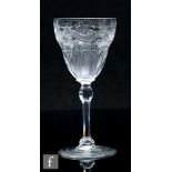 An early 20th Century Webbs rock crystal style drinking glass, circa 1910, the round funnel bowl,
