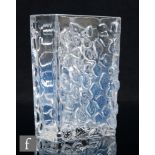 A 20th Century Swedish clear crystal vase, of rectangular section, decorated with moulded abstract