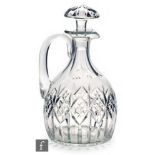 A mid 20th Century Webb Corbett clear crystal claret decanter, in the Regency manner, of