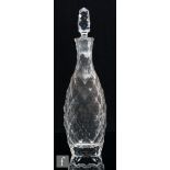 An early 20th Century Bohemian glass decanter, attributed to Moser, the club shaped decanter cut all