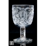 An early 20th Century Stourbridge Masonic oversized goblet, the round funnel bowl engraved with