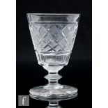 An early 19th Century glass rummer, circa 1810, the bucket bowl with hobnail cut decoration, above a