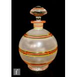 A mid 20th century Czechoslovakian decanter of globular form and decorated with bands of ochre and