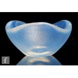 A large 1950s Orrefors crystal glass bowl designed by Sven Palmqvist, the triform body with heavy