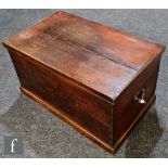 A 20th Century stained pine blanket box with twin wrought iron carrying handles, 83cm x 42cm x 49cm.