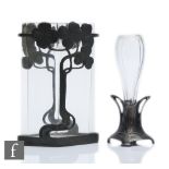 Two early 20th Century Art Nouveau pewter posy vases, the first of diamond form within a pewter