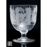 A large mid 19th Century Masonic glass goblet, the ovoid bowl engraved with Masonic symbols and