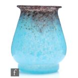 A 1930s Monart glass vase of angular form with a flared neck and foot, shape RA, the body in a