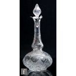An early 20th Century Webbs clear crystal claret jug in the rock crystal style, of squat ovoid