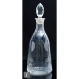 An early 19th Century French glass decanter, circa 1810-1820, of taper form with flat cut flutes