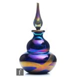 A contemporary Okra glass scent bottle of double gourd form, the purple ground with a trailed petrol