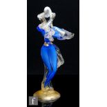 A 20th Century Murano glass figure, in blue period costume with applied clear crystal and gold