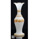 A tall 19th Century Stourbridge opal vase, possibly Richardsons, the slender shouldered ovoid body