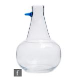 A Pukeberg glass carafe designed by Goran Warff, circa 1965, of globe and shaft form, clear body