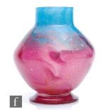 A 1930s glass vase in the manner of Monart, of footed and low shouldered ovoid form with collar
