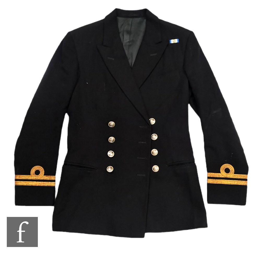 A British Royal Naval Lieutenant's jacket by Ambassador with South Atlantic ribbon and rosette,