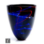 A later 20th Century studio glass vase by Morag Gordon, applied red trails over the deep blue
