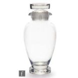 A post war Orrefors glass cocktail shaker designed by Nils Ladnberg, of footed ovoid form with