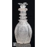 A Bohemian glass compartmental decanter, probably Harrachov, circa 1835, of Prussian form, the clear