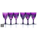 A set of six 19th Century Amethyst wine glasses, the round funnel bowl with basal slice cut