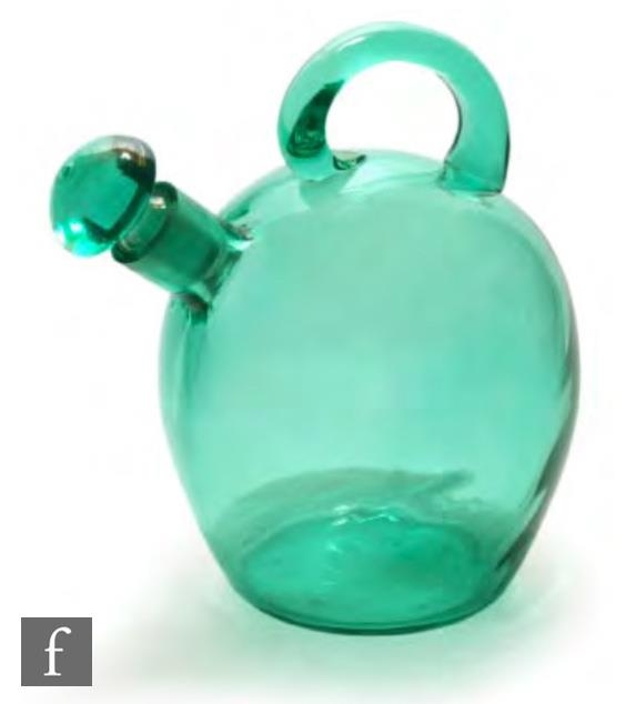 A 1930s possibly Czechoslovakian decanter, of spouted globular form with applied handle all in