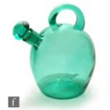 A 1930s possibly Czechoslovakian decanter, of spouted globular form with applied handle all in