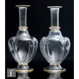 A pair of 20th Century Lobmeyr clear crystal glass carafes, of quatro lobed footed form with tall