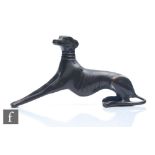 A contemporary bronze study of a seated dog with outstretched front legs, length 20cm.