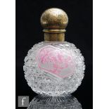 A late 19th Century Stuart & Sons padded cameo glass scent bottle of spherical form with a