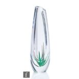 A 1950s Kosta glass vase designed by Vicke Lindstrand, the tapered torpedo form internally decorated