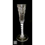 An 18th Century Ratafia glass circa 1765, the elongated round funnel bowl above a double series