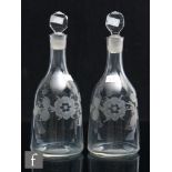 A pair of 18th Century Jacobite 'Sugarloaf' decanters, circa 1755-60, each engraved with rose on