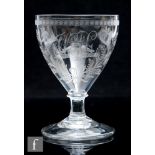 An early 19th Century marriage goblet, circa 1820-1830, the round funnel bowl engraved with