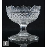 A late Georgian Irish clear cut crystal table centre bowl, circa 1800, the high scalloped rim