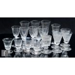 An assorted collection of 19th Century clear crystal drinking glasses with slice cut and diamond