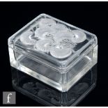 A Rene Lalique Bluets lidded box, model 99, circa 1936, of rectangular form with canted edges,