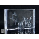 A 20th Century clear crystal glass slab weight, of rectangular form, reverse engraved details by