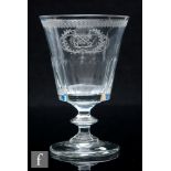 An early 19th Century glass goblet, circa 1810, the bucket bowl engraved with crossed keys within